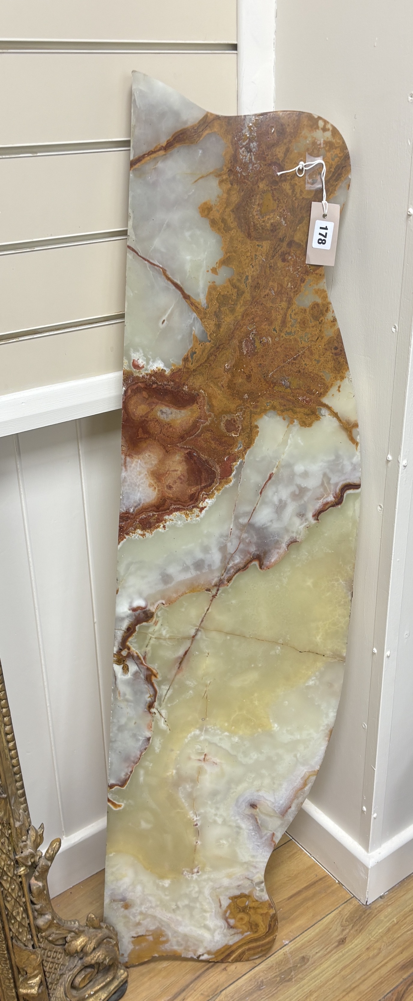 A green onyx top giltwood and composition console table, width 125cm, depth 32cm, height 74cm